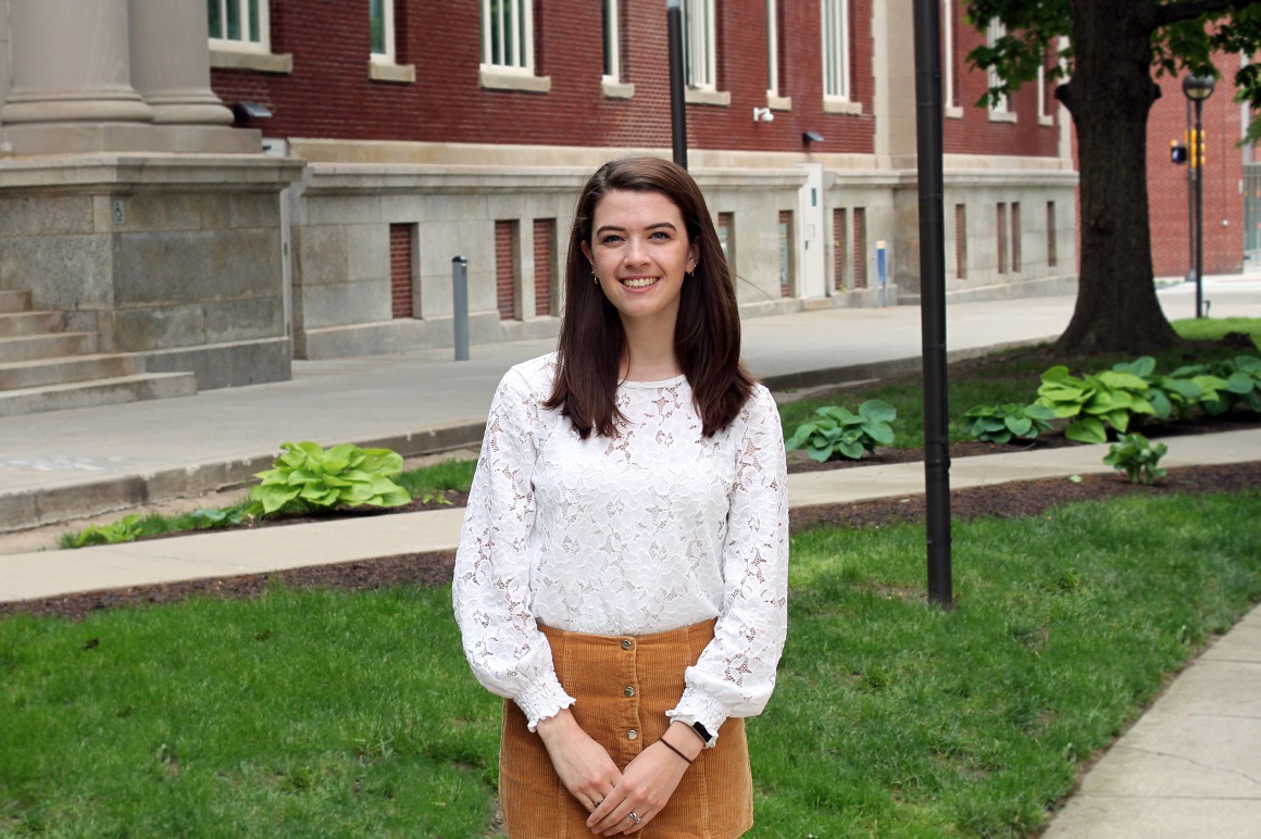 Student standing outside on campus